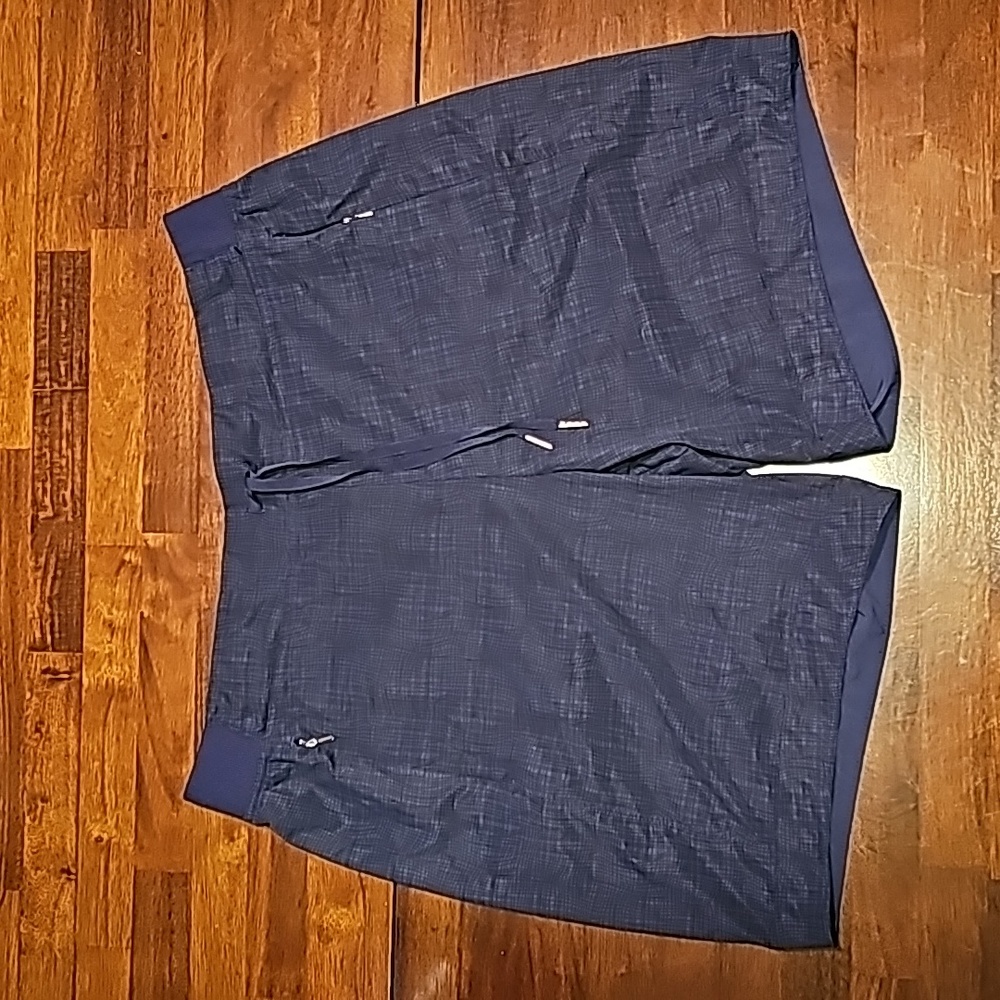 Calia Navy and Black elastic waist shorts.
